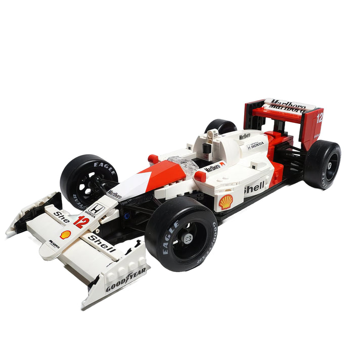 LEGO McLaren MP4/4 (10330): Iconic F1 car, 693 pieces. 1:18 scale, Senna minifigure. Working steering, suspension. Adult 18+ set. Perfect display piece.