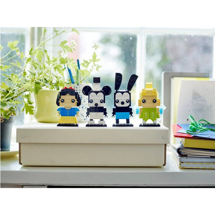 Build Disney magic with LEGO 40622! Mickey, Snow White, Tinker Bell, and Oswald BrickHeadz celebrate 100 years. Perfect collectible for Disney fans 10+.